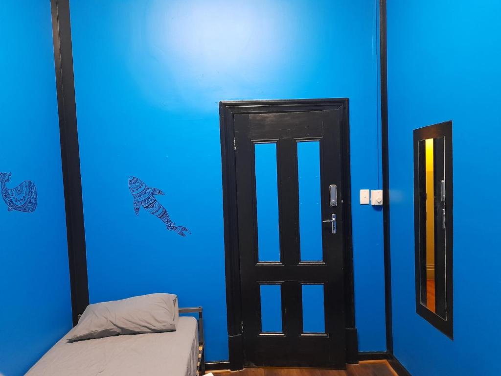 Postel nebo postele na pokoji v ubytování Ozi Inn Backpackers - Perth -Valid Passport Required