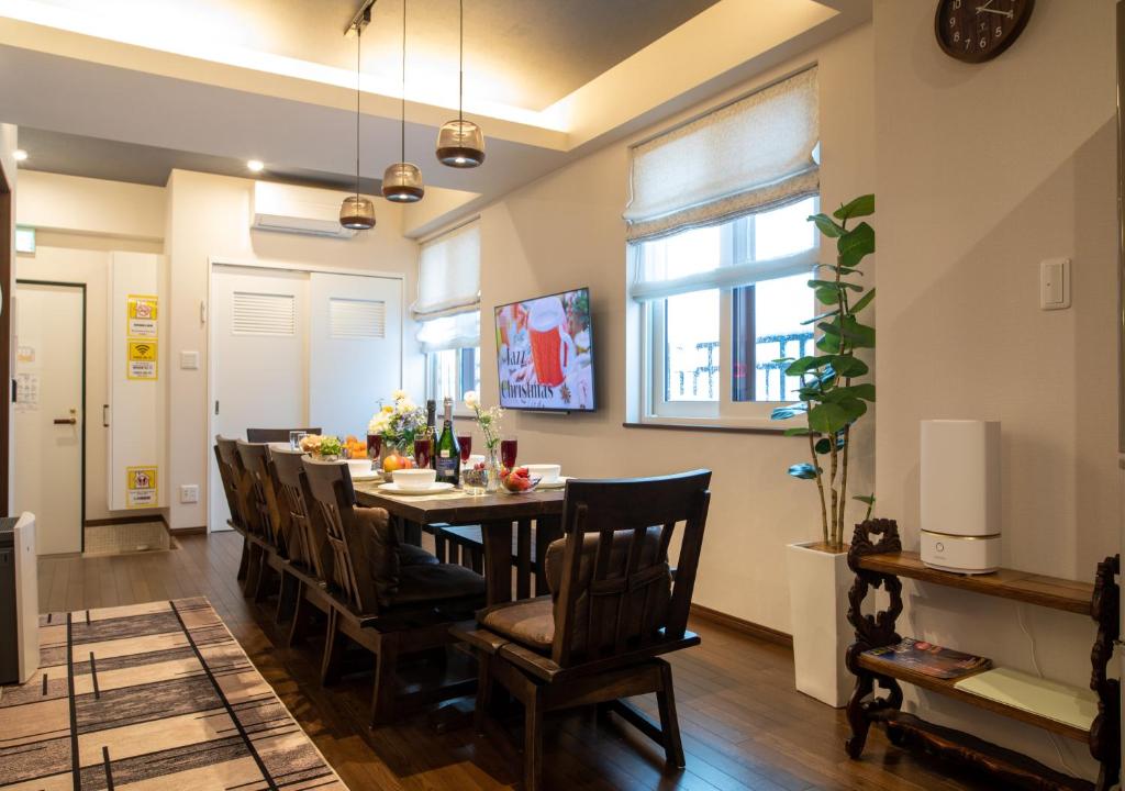 TV a/nebo společenská místnost v ubytování Miidokoro House Hotel