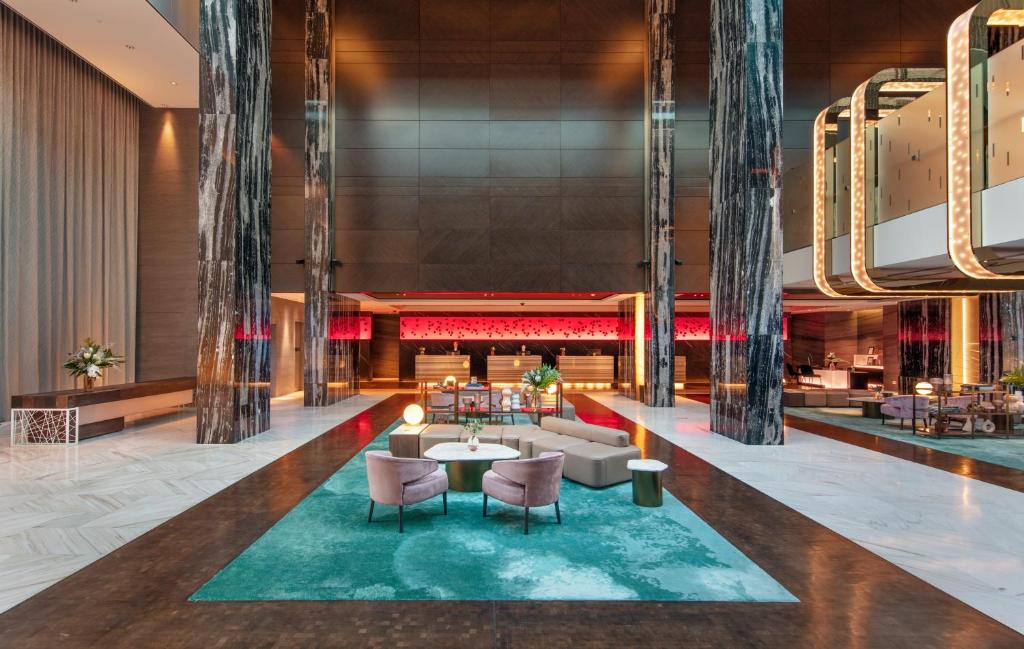 a rendering of the lobby of the mandarin oriental singapore at The Darling at The Star in Sydney