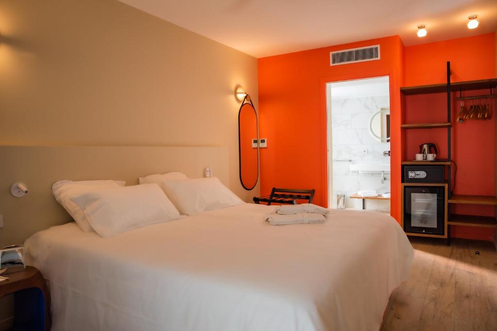 Postel nebo postele na pokoji v ubytování Boutik Hôtel 2A - Adult Only