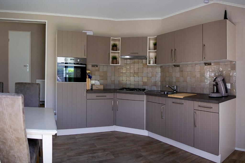 Kuchyň nebo kuchyňský kout v ubytování luxe cottage knokke heist