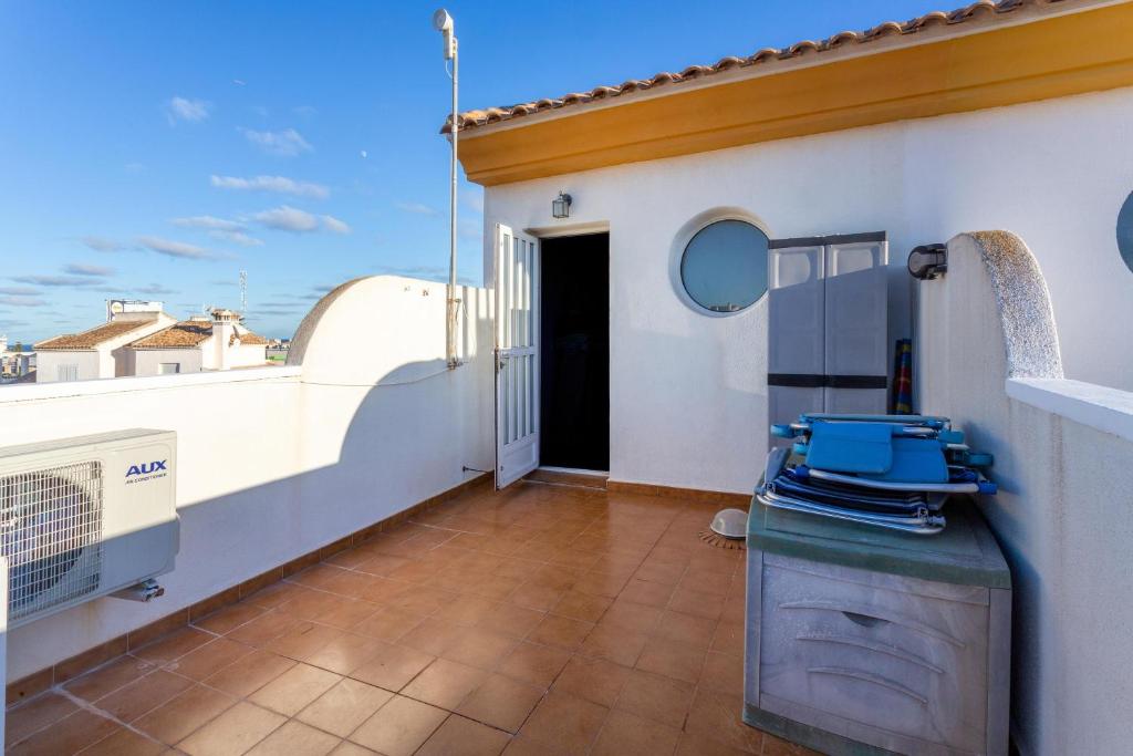 Fotografie z fotogalerie ubytování Pool-side townhouse in Cabo Roig v destinaci Orihuela