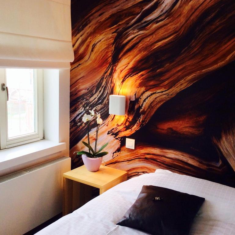 Postel nebo postele na pokoji v ubytování B&B Lisdodde