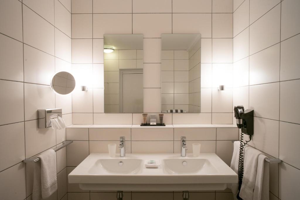 Koupelna v ubytování Hôtel - Spa Les Corderies