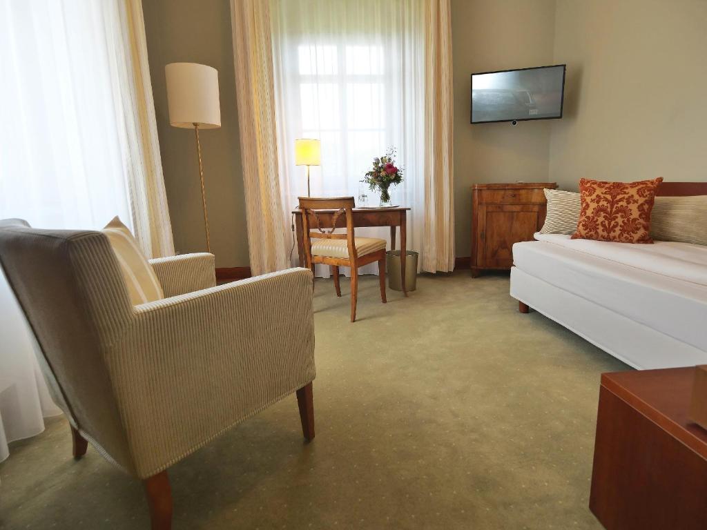 Postel nebo postele na pokoji v ubytování Hotel Martha Dresden