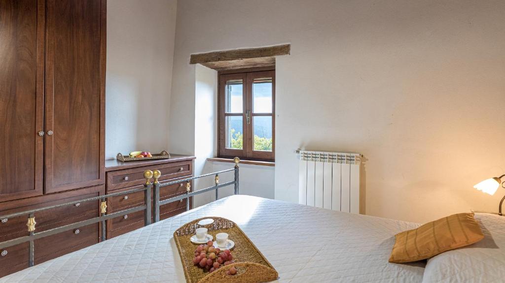 Posteľ alebo postele v izbe v ubytovaní CASA LARGNANO 6&2, Emma Villas