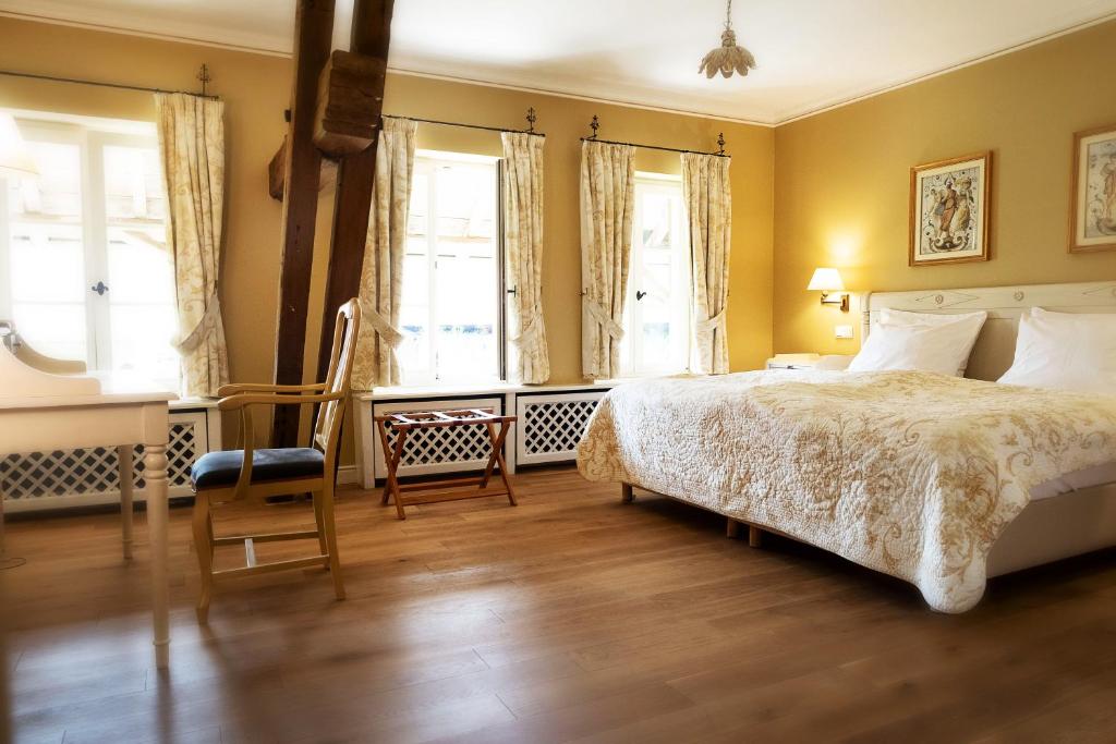 Postel nebo postele na pokoji v ubytování Der Linslerhof - Hotel, Restaurant, Events & Natur