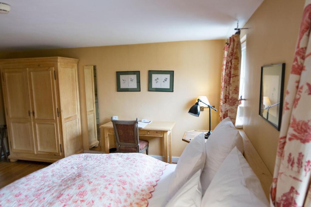 Postel nebo postele na pokoji v ubytování Der Linslerhof - Hotel, Restaurant, Events & Natur