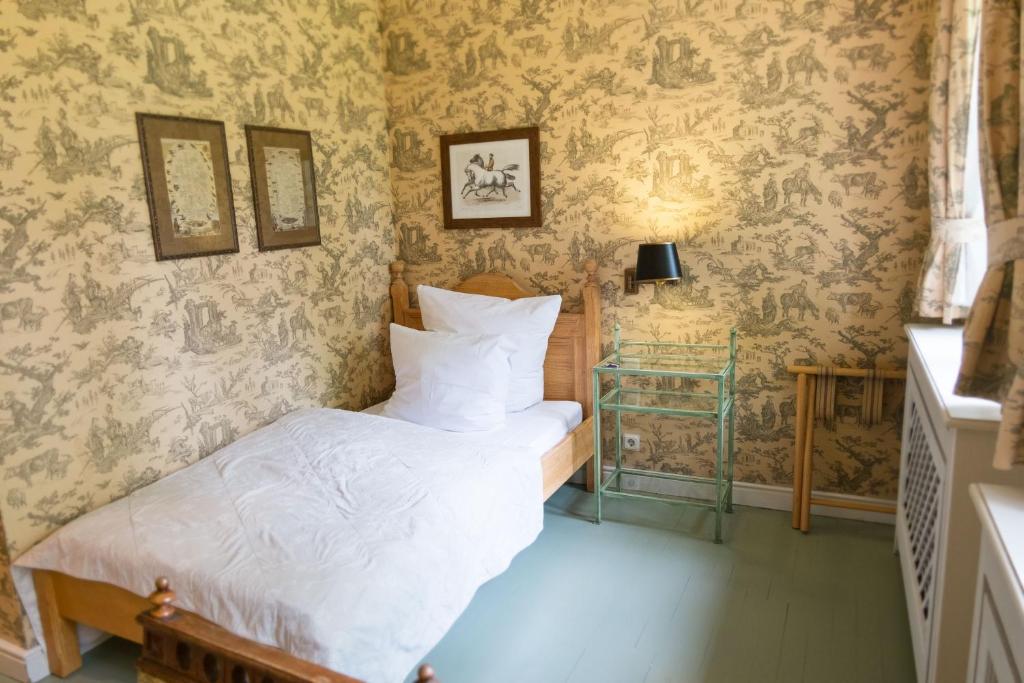 Postel nebo postele na pokoji v ubytování Der Linslerhof - Hotel, Restaurant, Events & Natur