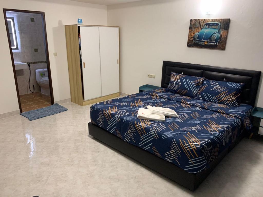 Postel nebo postele na pokoji v ubytování Beverly Hills Villa Patong
