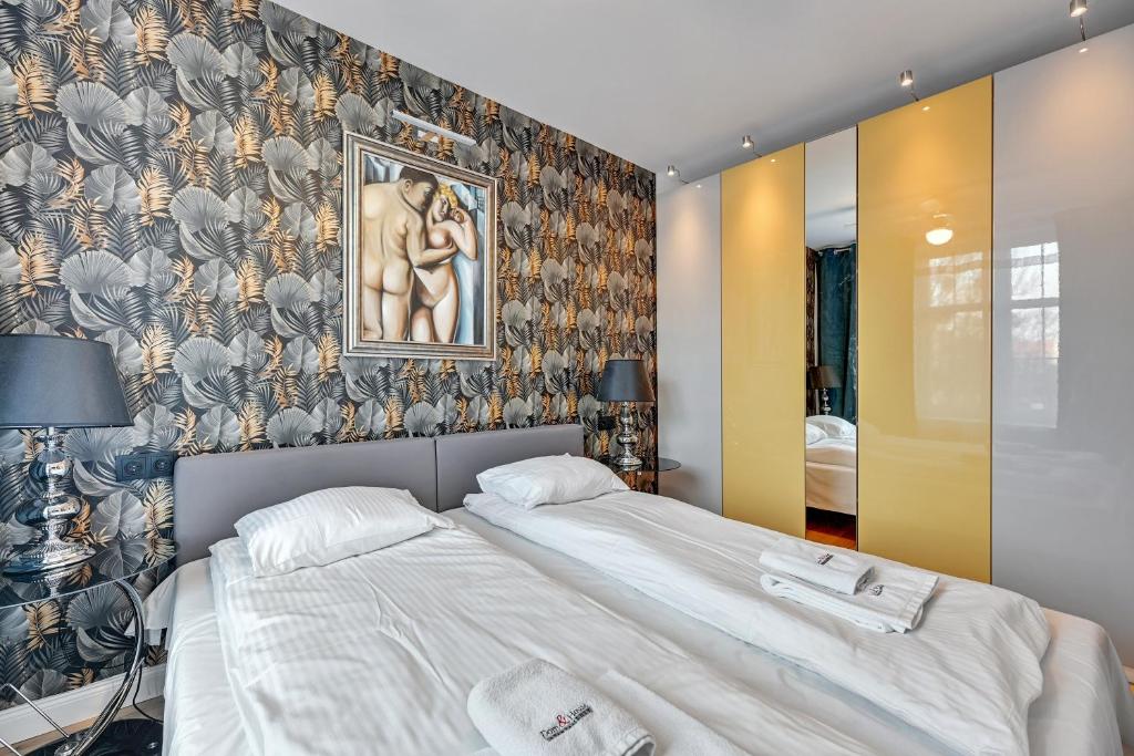 Posteľ alebo postele v izbe v ubytovaní Dom & House - Apartment Old Town Szeroka