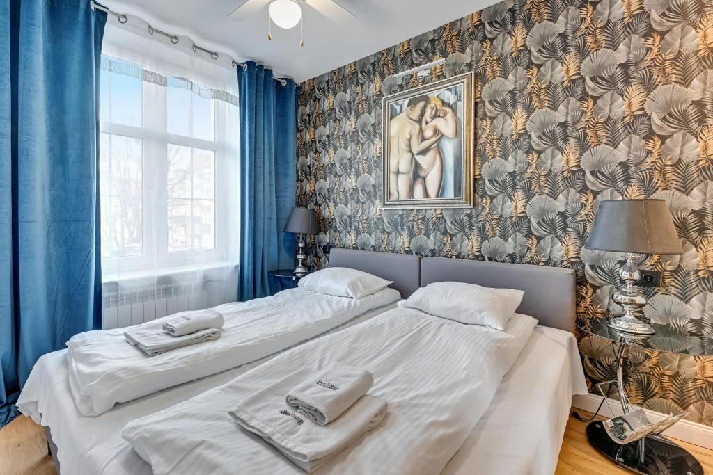 Posteľ alebo postele v izbe v ubytovaní Dom & House - Apartment Old Town Szeroka