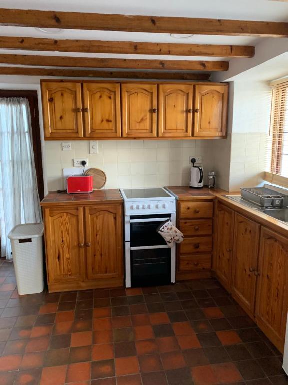 Kuchyň nebo kuchyňský kout v ubytování Killeena House