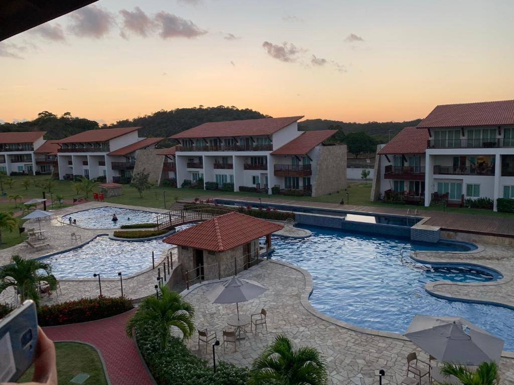 vista para uma piscina num resort em Flat no Club Meridional de Carneiros - Bloco 4-2PP em Tamandaré
