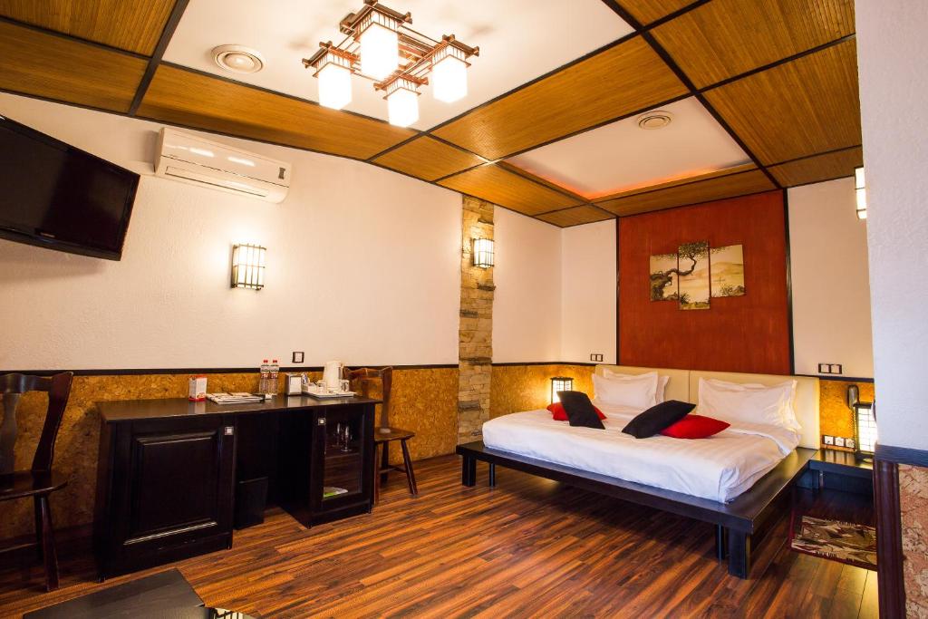 Postel nebo postele na pokoji v ubytování Spa-Hotel Myslyvskiy Dvir