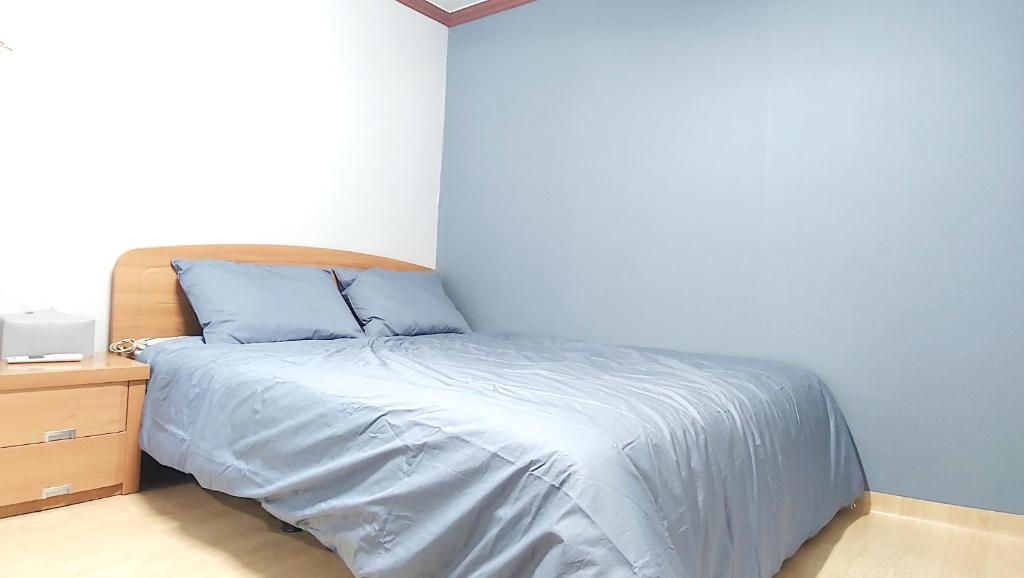 Postel nebo postele na pokoji v ubytování Healinghouse Peakjang