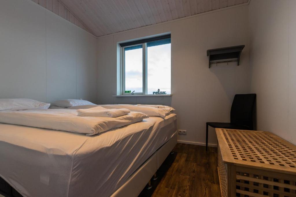 Postel nebo postele na pokoji v ubytování Margrétarhof