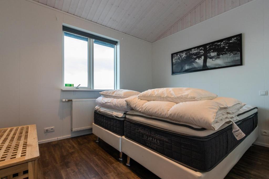 Postel nebo postele na pokoji v ubytování Margrétarhof
