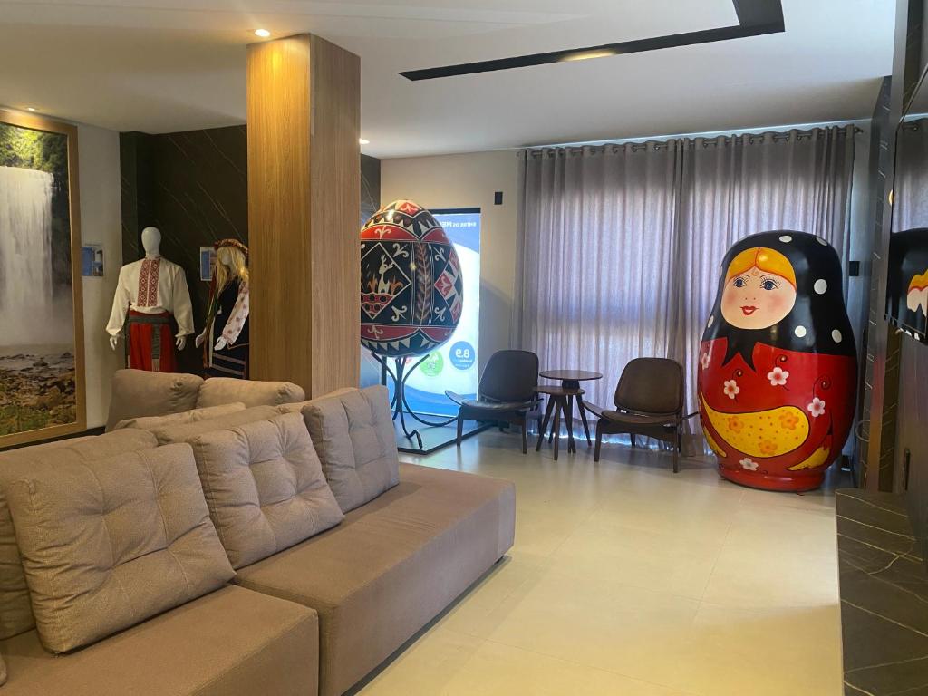 Posezení v ubytování Mayná Hotel Prudentópolis Centro
