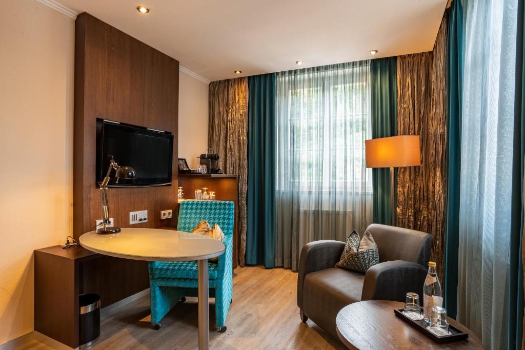 TV a/nebo společenská místnost v ubytování Hotel Residenz Passau