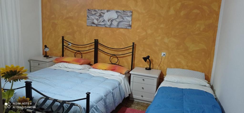 Postel nebo postele na pokoji v ubytování La Piccola Siesta b&b