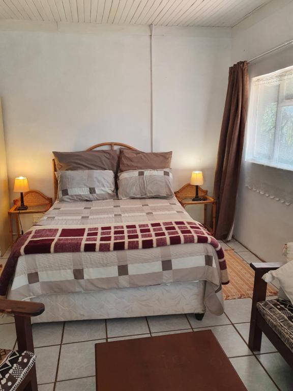 Llit o llits en una habitació de Kaapsche Draai
