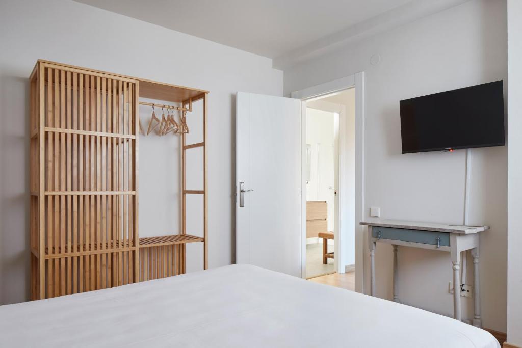 Postel nebo postele na pokoji v ubytování Hostal Rural Aritzalko