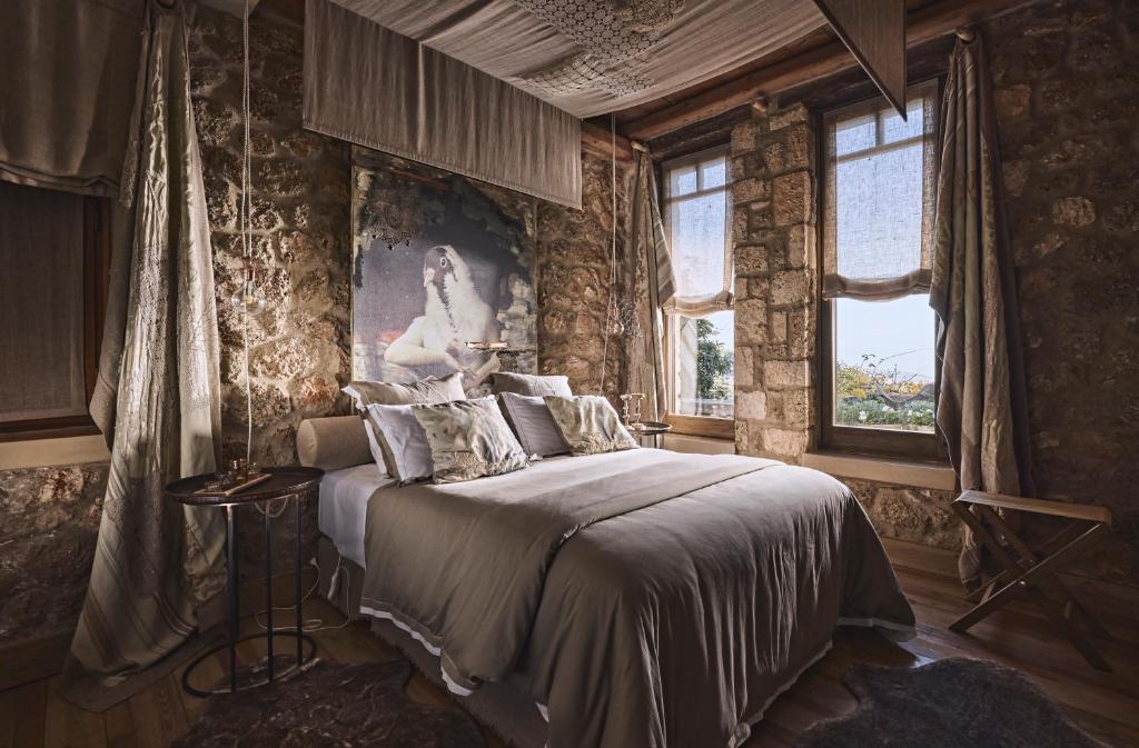 Postel nebo postele na pokoji v ubytování Area Synest Nature Suites