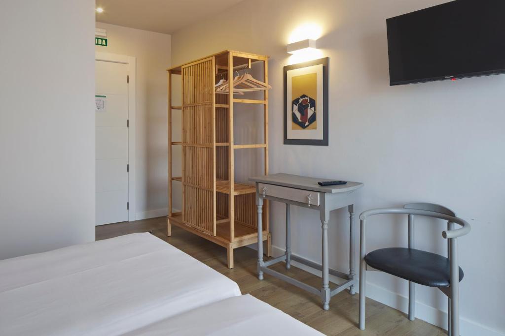 Postel nebo postele na pokoji v ubytování Hostal Rural Aritzalko
