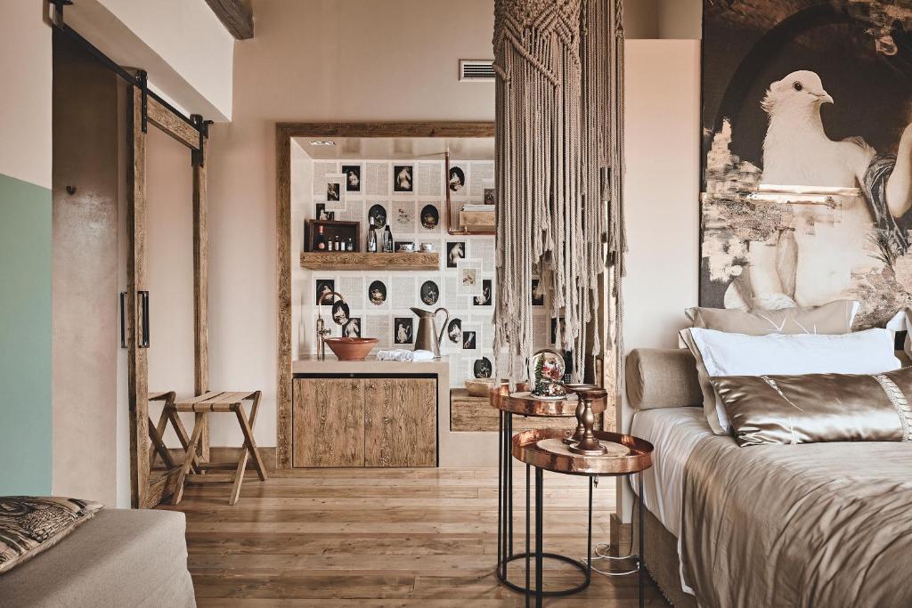 Postel nebo postele na pokoji v ubytování Area Synest Nature Suites