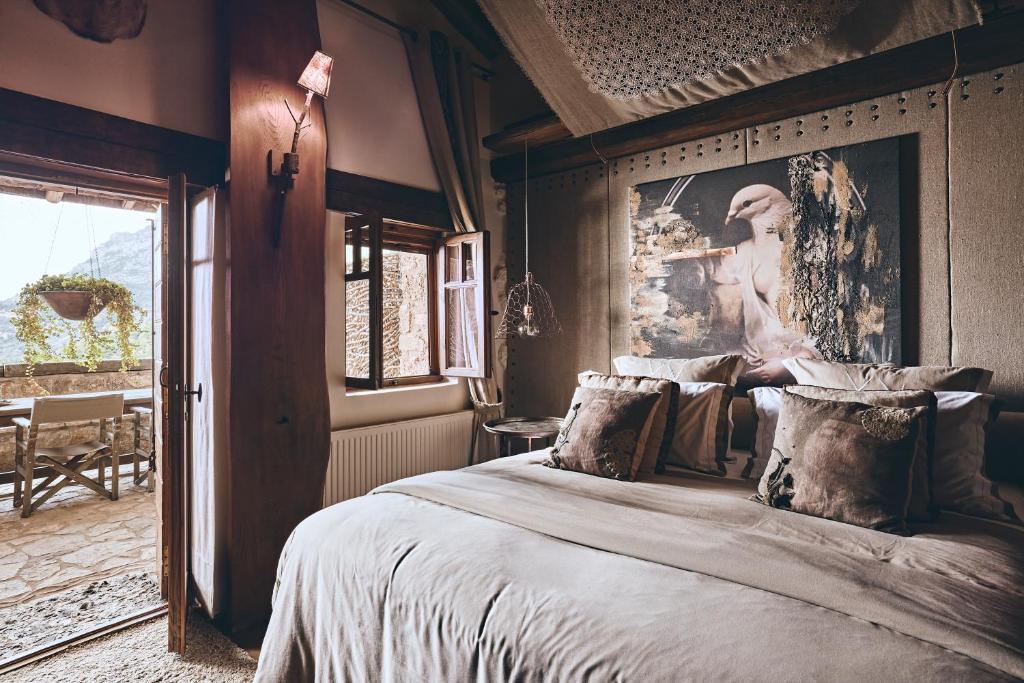 Postel nebo postele na pokoji v ubytování Area Synest Nature Suites