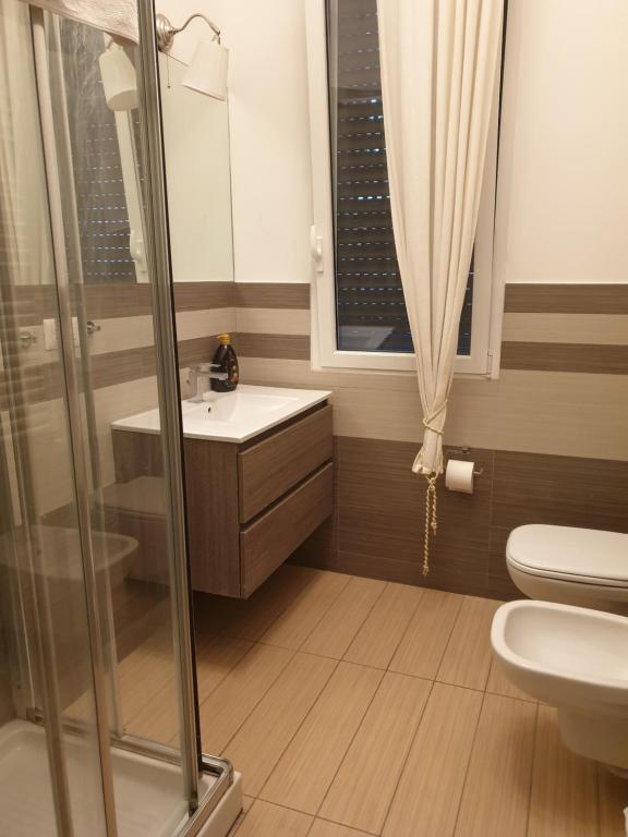Koupelna v ubytování Michelangelo Apartments con parcheggio gratuito in loco e self check in