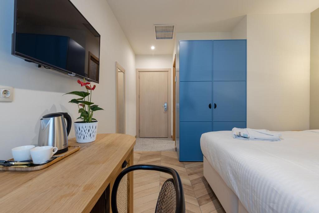 Postel nebo postele na pokoji v ubytování MiraMar Luxury Residences
