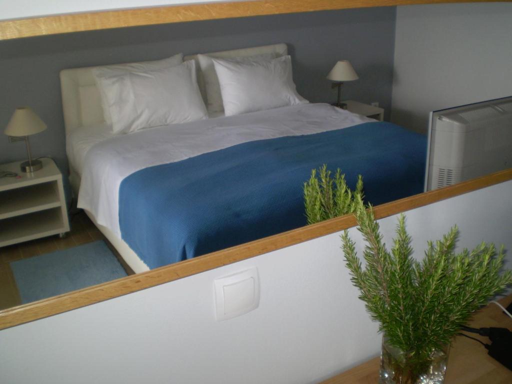Postel nebo postele na pokoji v ubytování Athena Hotel