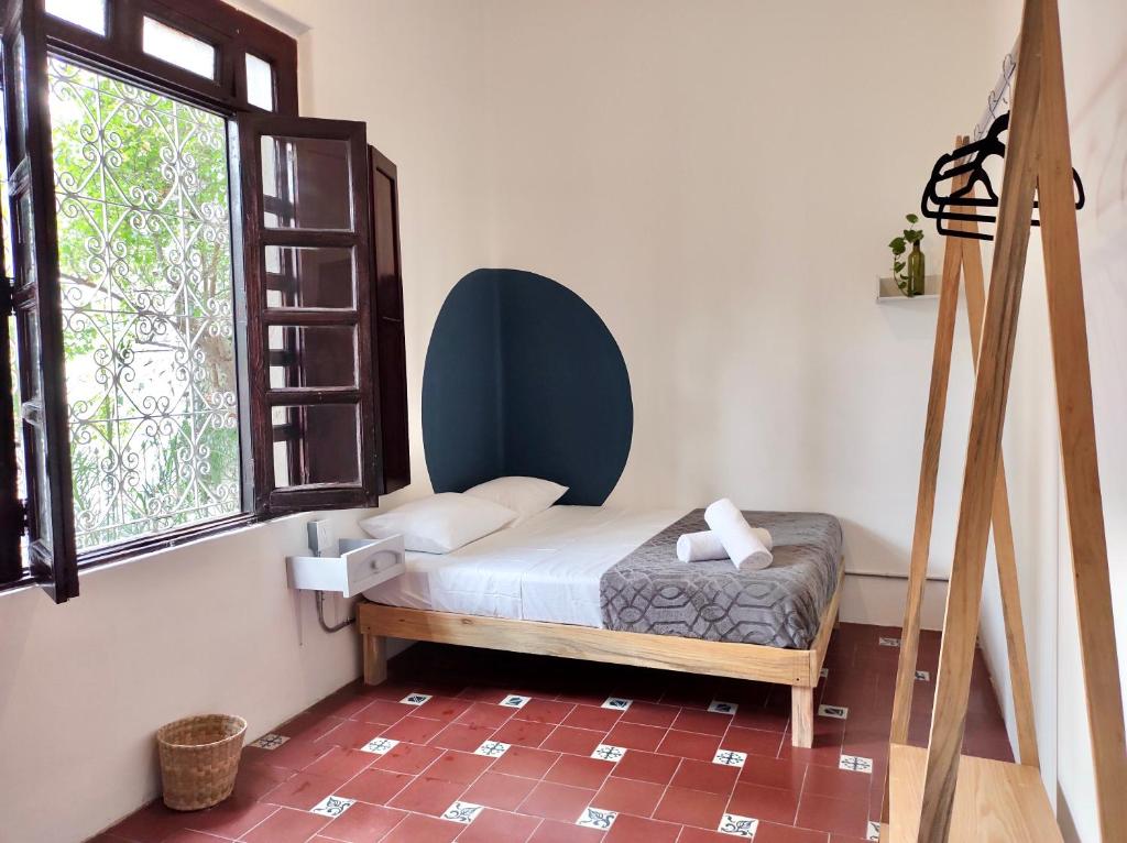 Postel nebo postele na pokoji v ubytování Coliving Chingon