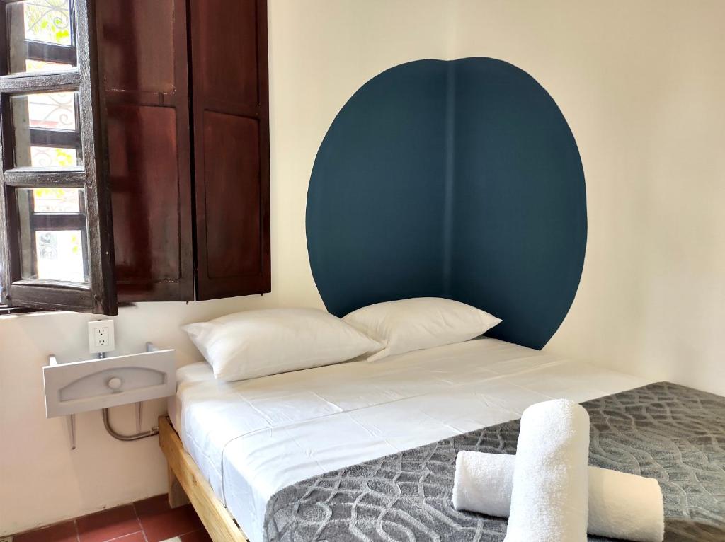 Postel nebo postele na pokoji v ubytování Coliving Chingon