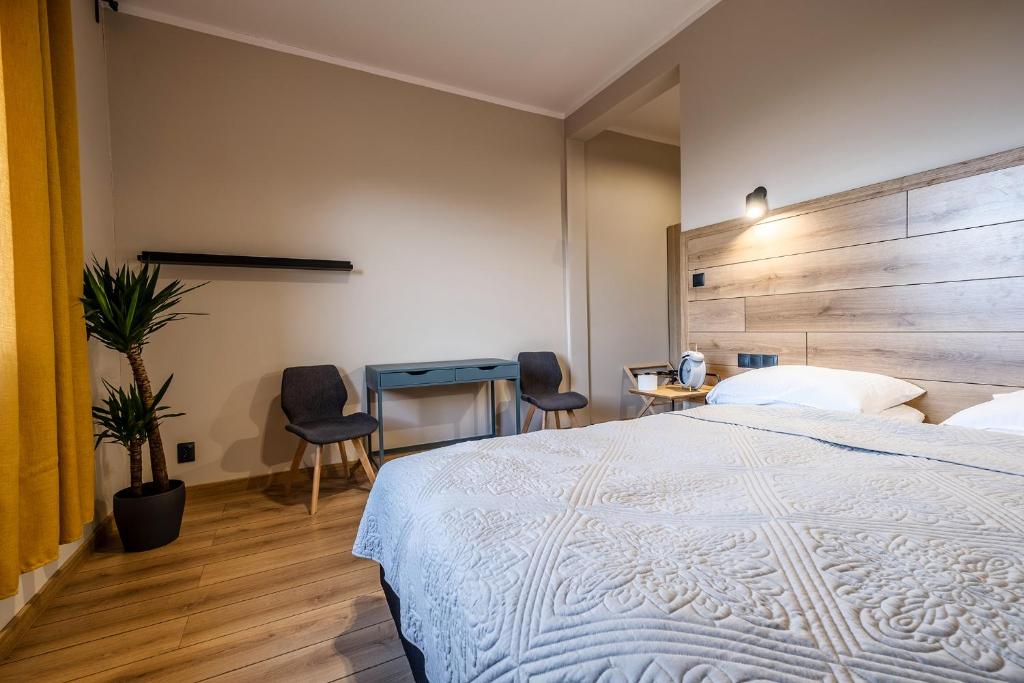 Postel nebo postele na pokoji v ubytování MONTEZERA sauna i widok na góry