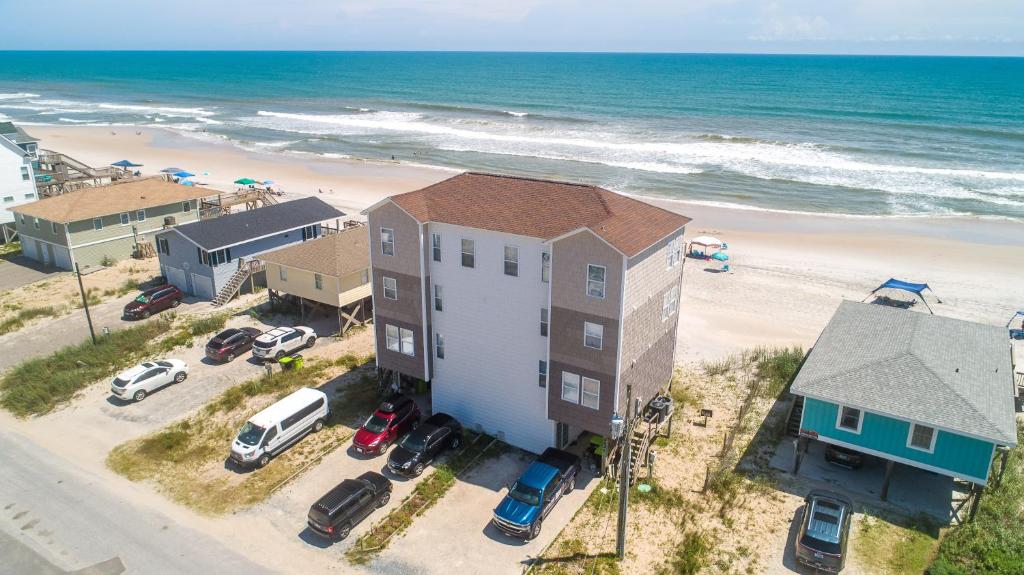an aerial view of a house and the beach at Coastal Memories in North Topsail Beach