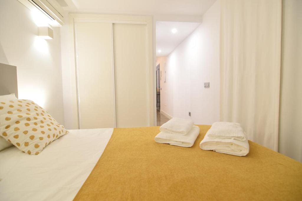 A bed or beds in a room at Loft Van Gogh, Centro Histórico