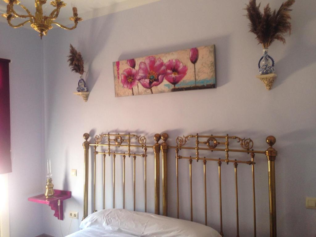 Postel nebo postele na pokoji v ubytování Hotel Rural las Cinco Ranas