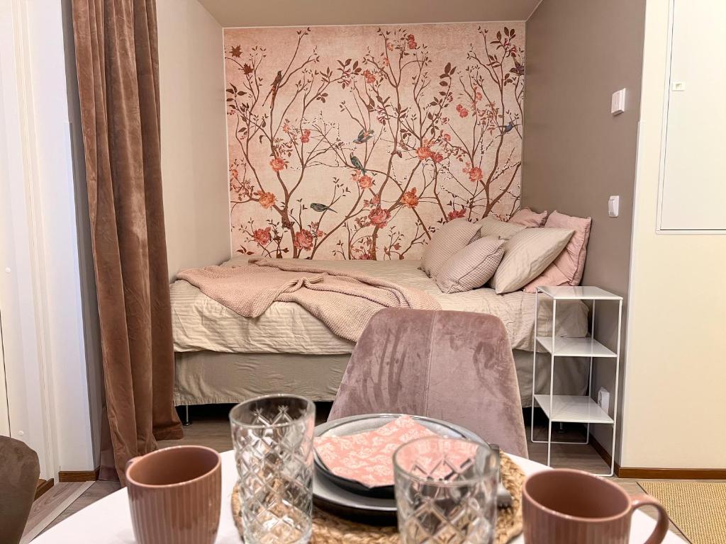 Postel nebo postele na pokoji v ubytování Lapland Romance Apartment