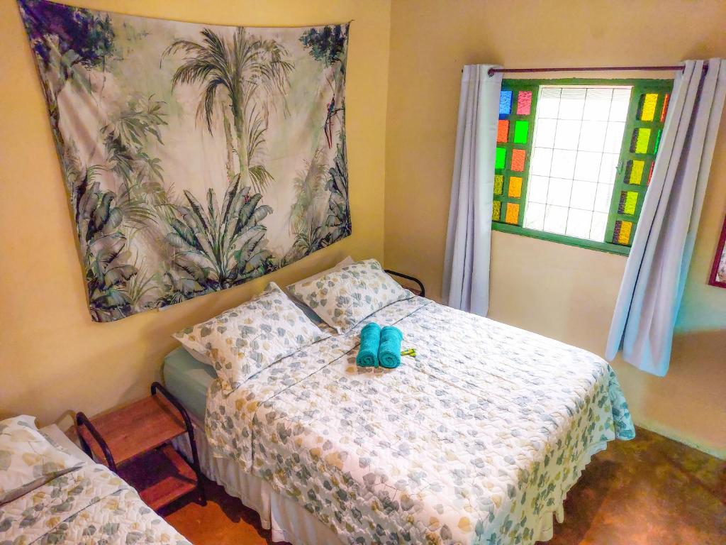 Giường trong phòng chung tại Canto da Coruja - ECOHOSPEDAGEM