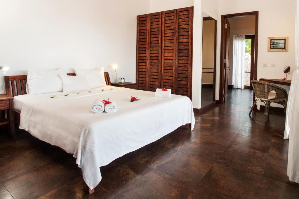 Postel nebo postele na pokoji v ubytování Villas de Jardin self-catering