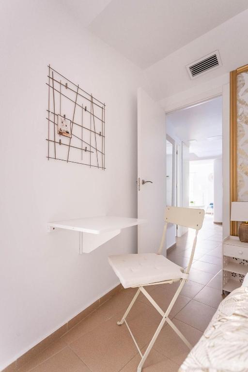 Postel nebo postele na pokoji v ubytování Goyeneta Luxury Suite