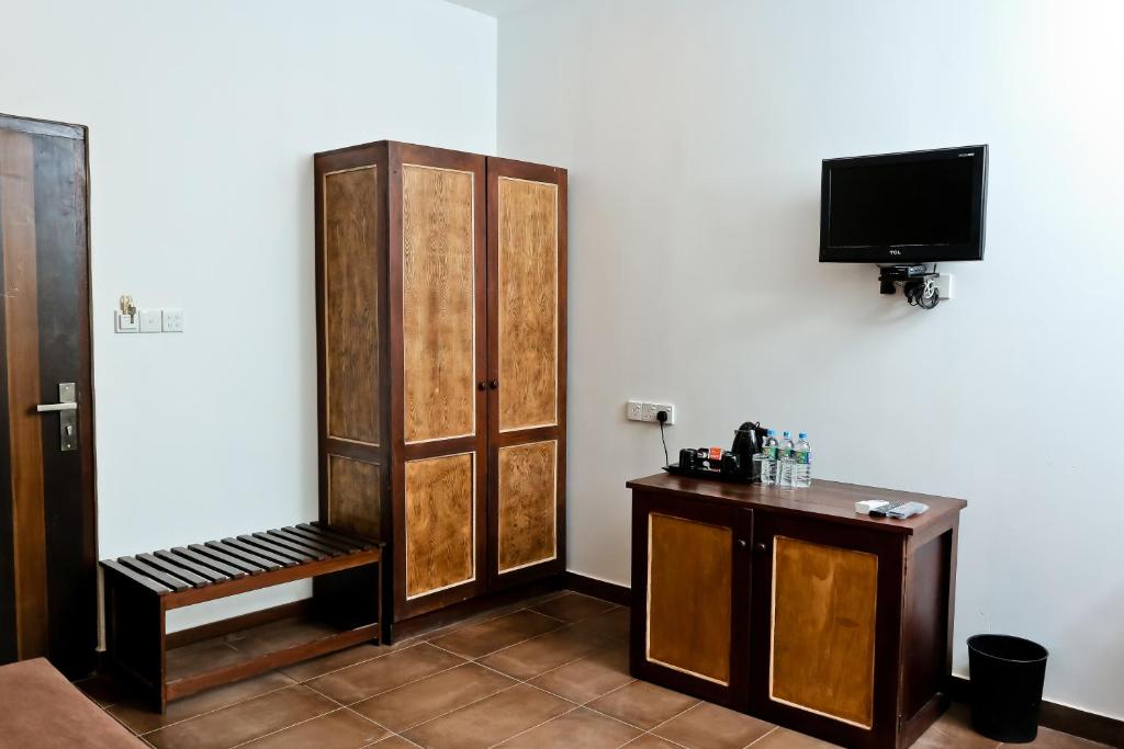 TV a/nebo společenská místnost v ubytování Golden Star Beach Hotel