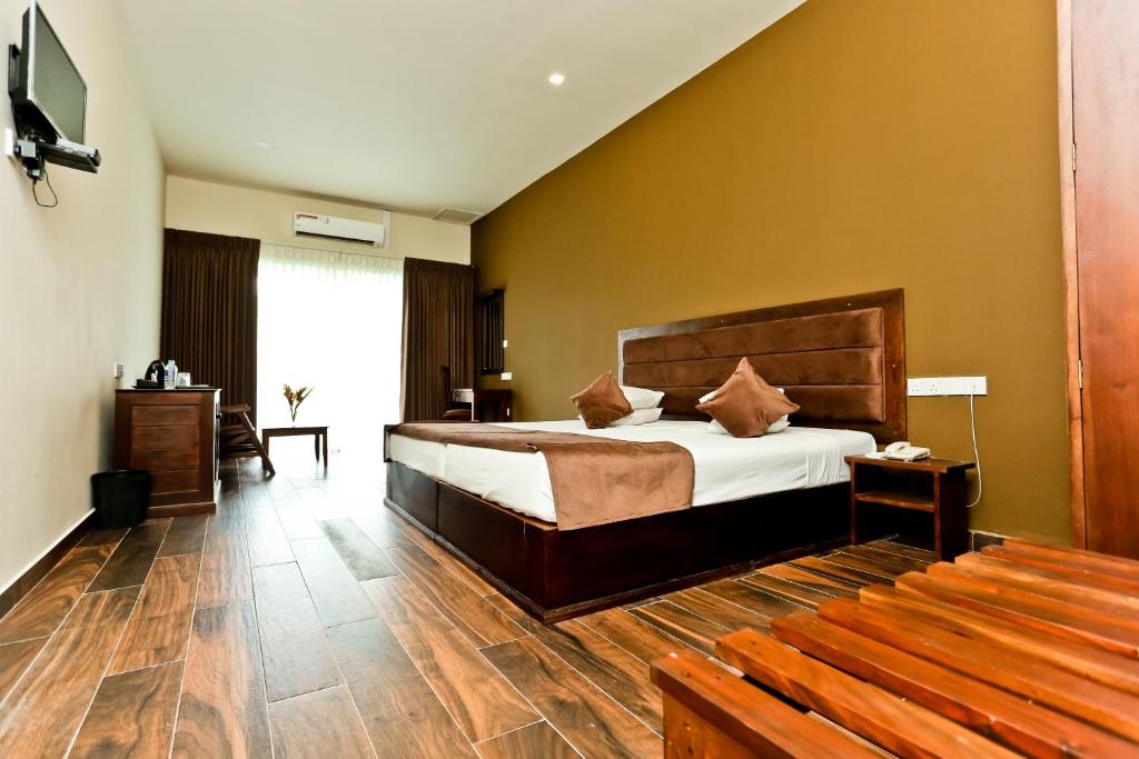 TV a/nebo společenská místnost v ubytování Golden Star Beach Hotel