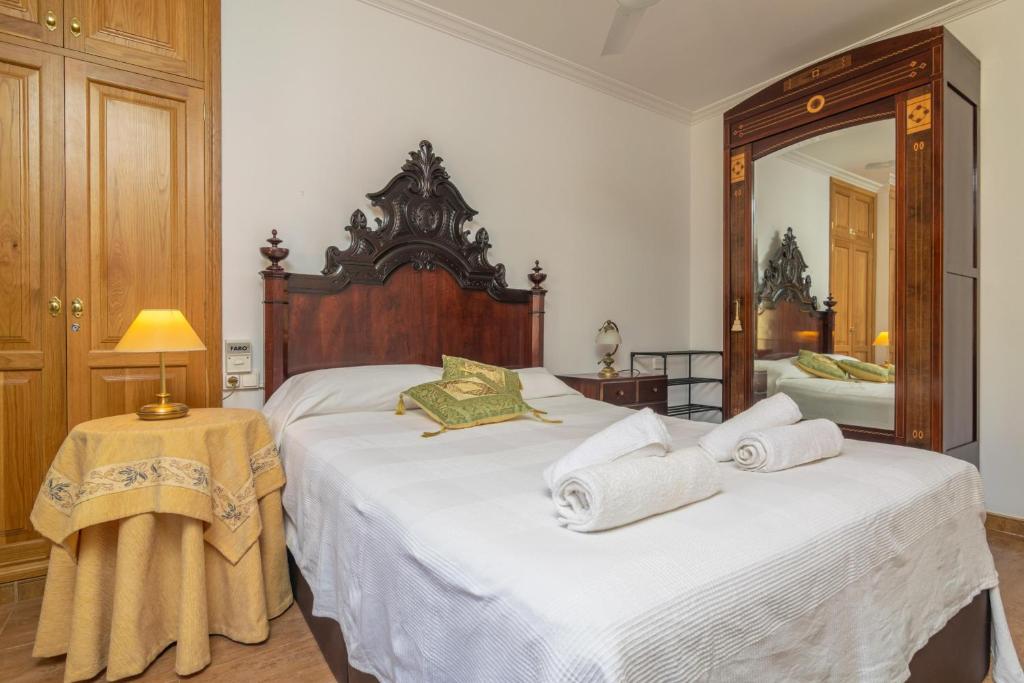 A bed or beds in a room at Can Serra -Santa Margalida-