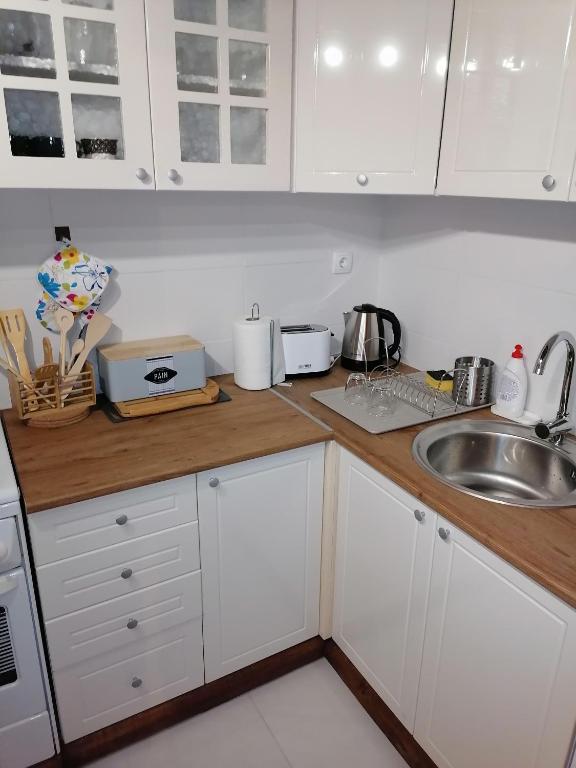 Kuchyň nebo kuchyňský kout v ubytování Apartman Štimac