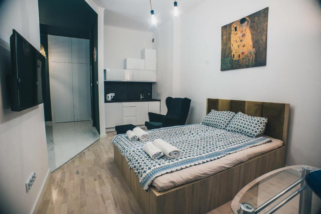 Posteľ alebo postele v izbe v ubytovaní YOURAPART STARÓWKA z JACUZZI
