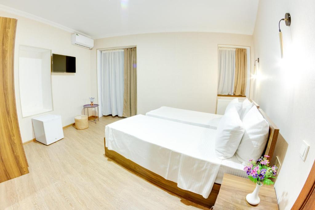 Sina Hotel - Standaard Tweepersoons- Of Tweelingkamer